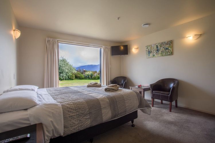 Bedroom with Lake Te Anau and mountain views