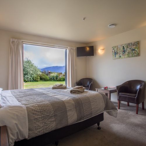 Bedroom with Lake Te Anau and mountain views